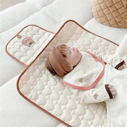 The Happy Tail Co Portable Foldable Waterproof Diaper Changing Pad - Travel Friendly Nappy Floor Change Play Mat